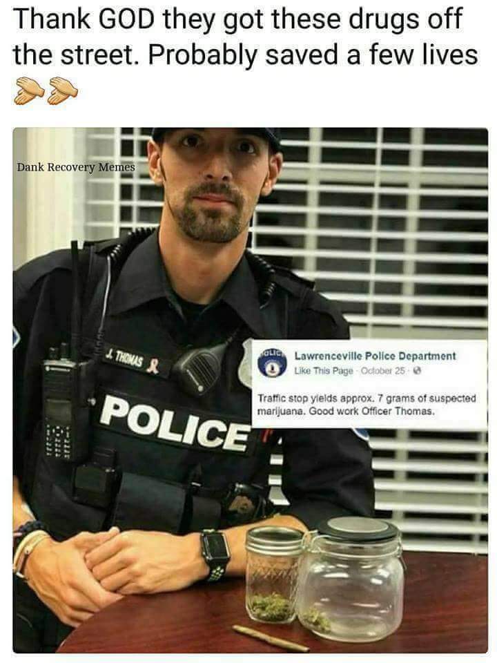 Police Officer with Confiscated Drugs