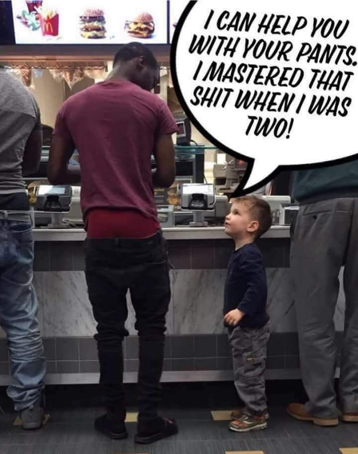 Child Offers Help with Pants